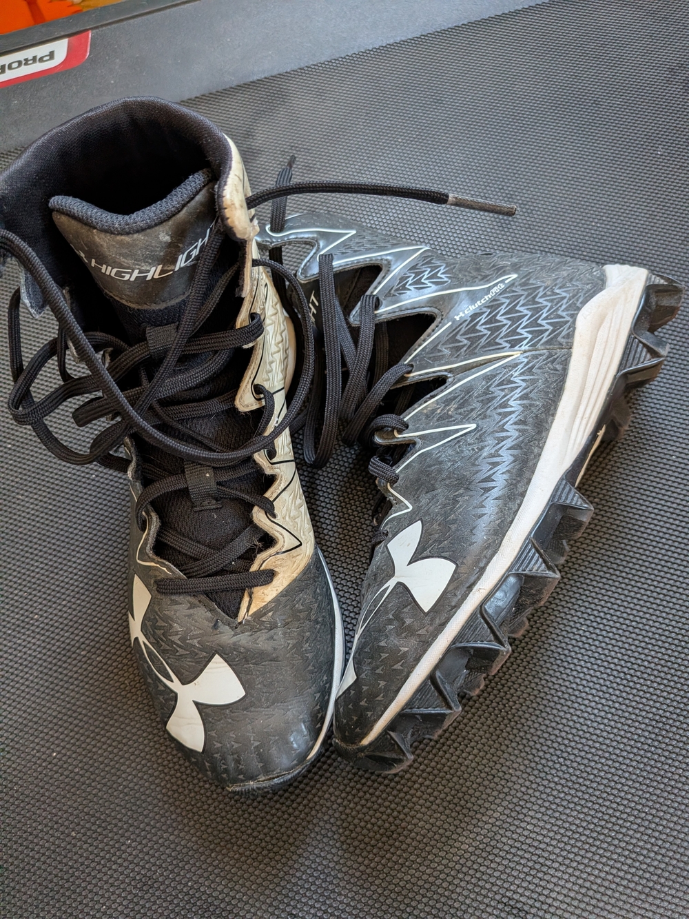 Under Armour Black and White Cleats - High Top Football Shoes